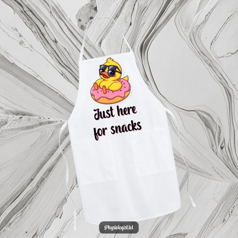 Funny rubber ducky in sunglasses relaxing on a donut, featured on an apron, adding humor to kitchen activities and attire.