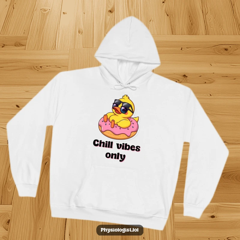 Funny rubber ducky in sunglasses relaxing on a donut, featured on a cozy hoodie, radiating a humorous and chill persona.