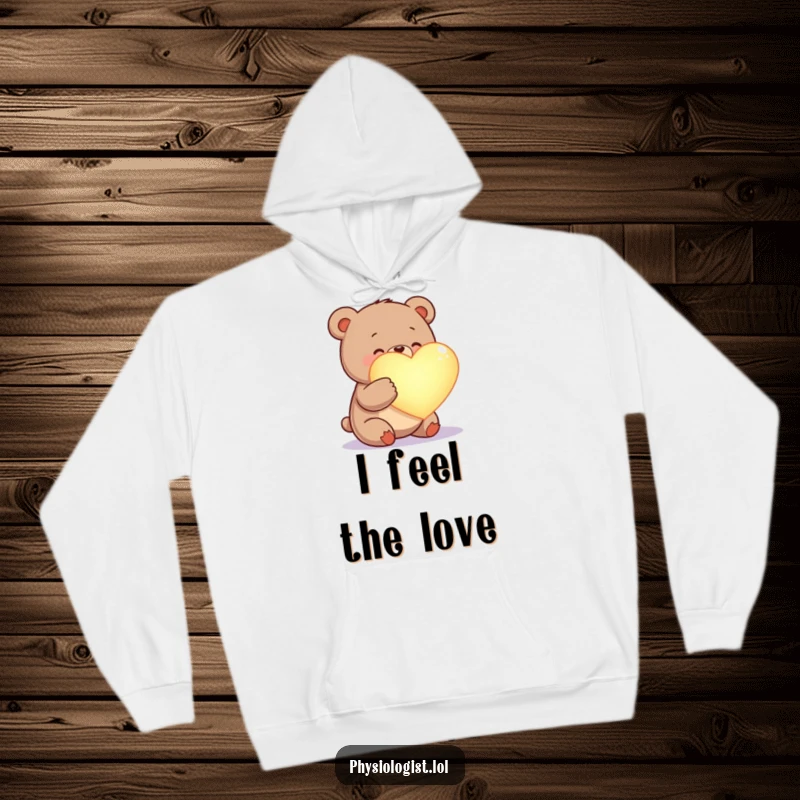 Funny happy bear hoodie, examining a glowing heart, spreading warmth and comfort, cozy and heartwarming attire.